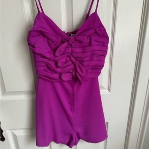 purple/pink romper with bows size s brand DO+BE